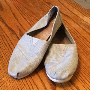 Toms Gray and white shoes.